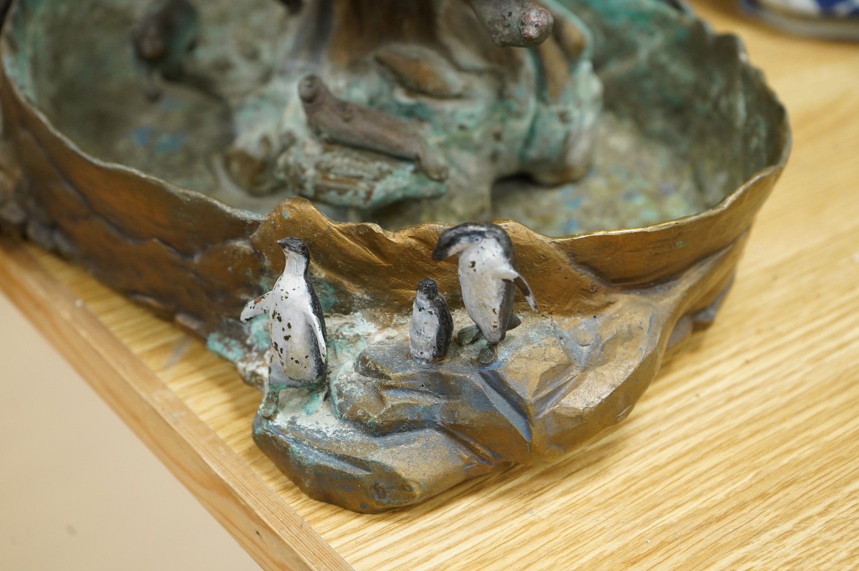 A Franklin Mint, decorative cast metal animal rockery, limited edition 1058/9500, 39cm high